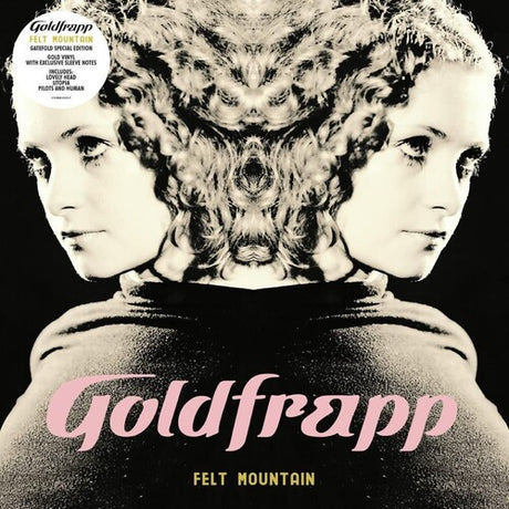 Album cover for Goldfrapp's 'Felt Mountain' with a stylized portrait and text.