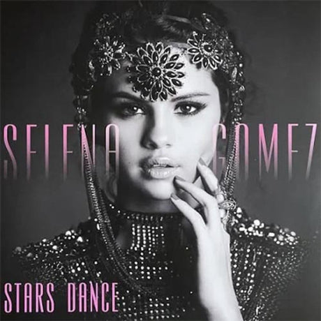 Black and white album cover of Selena Gomez with a floral headpiece, wearing a beaded outfit, with the text 'STELLA GOMEZ STARS DANCE' on the top and bottom.