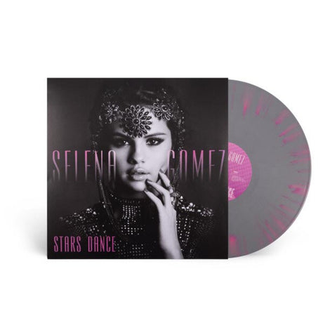 Black and white album cover of Selena Gomez with a floral headpiece, wearing a beaded outfit, with the text 'STELLA GOMEZ STARS DANCE' on the top and bottom.
