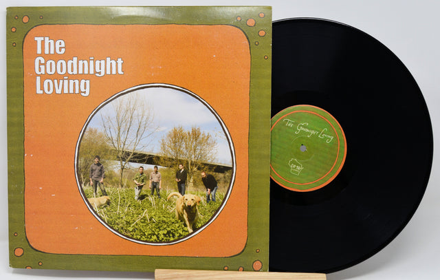Vinyl record with cover featuring a group of people and dogs in a field, titled 'The Goodnight Loving'.