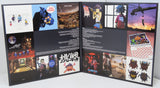 Open vinyl record gatefold cover with various illustrations and images on a white background