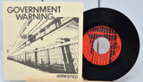 Government Warning - Arrested