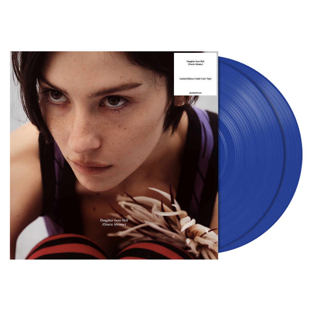 Vinyl record with a blue disc and cover featuring Gracie Abrams' face.