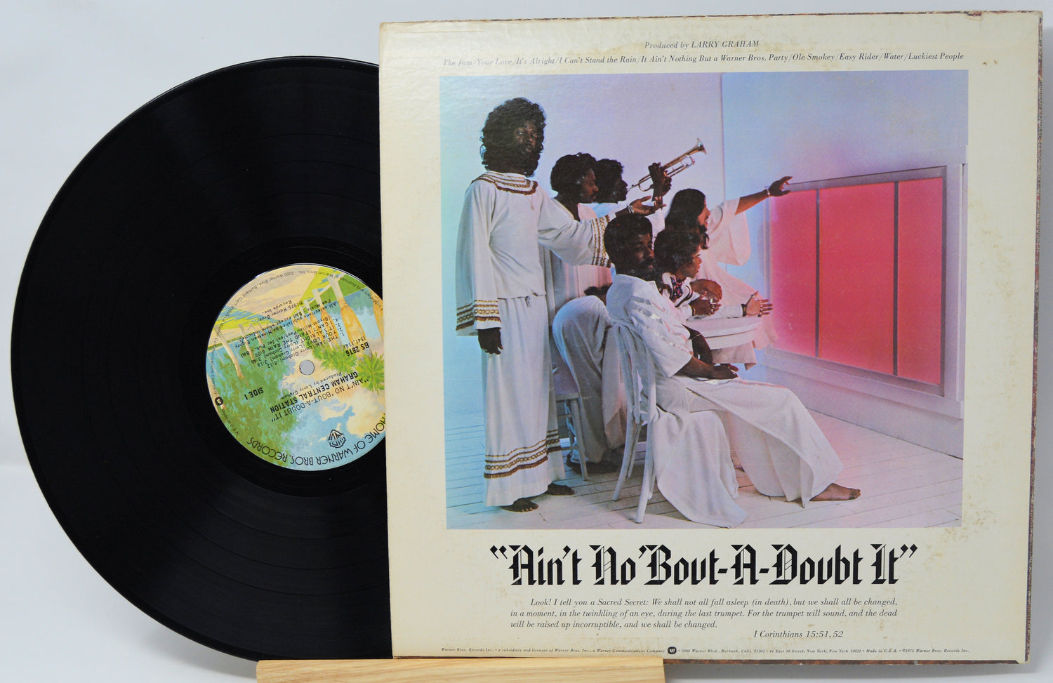 Vinyl record with its cover featuring a group of people and text 'Ain't No Bout-A-Doubt It'.