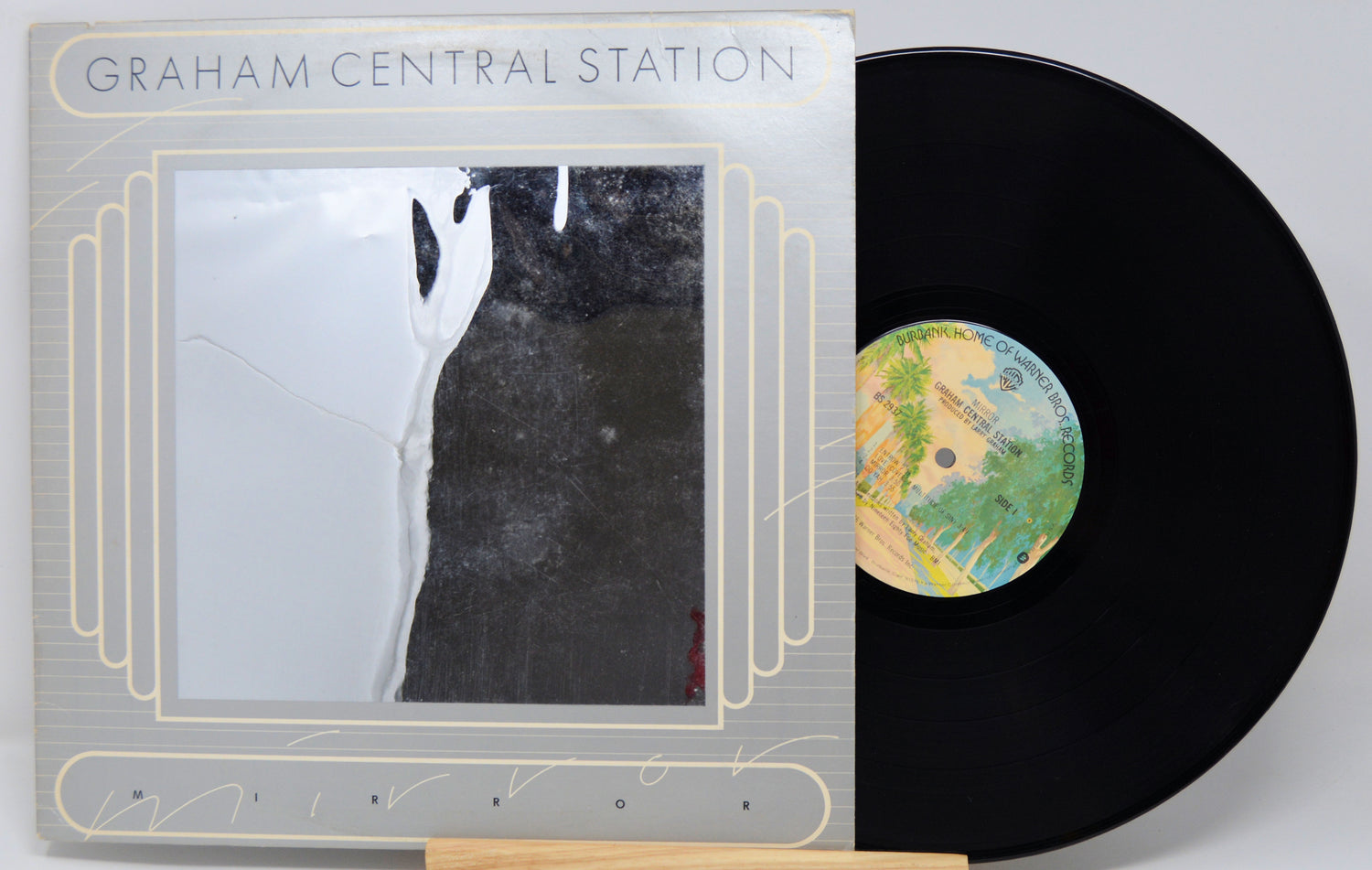 Vinyl record with cover titled 'Graham Central Station' on a white background