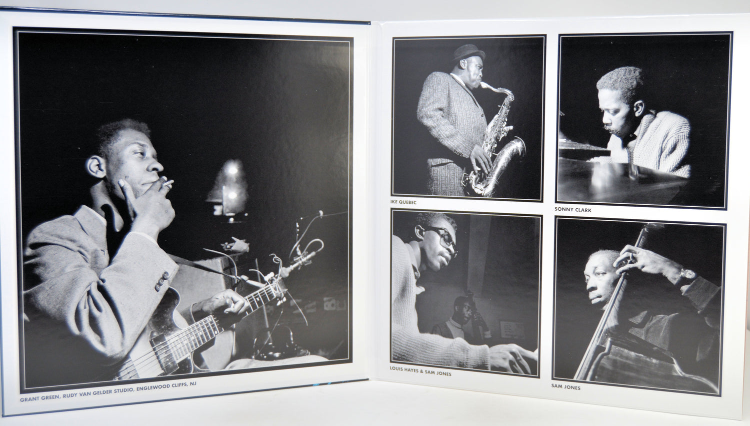 A black-and-white printed program or booklet spread showing four jazz musician photographs: a large portrait of a guitaritst on the left and four smaller portraits arranged in a grid on the right.