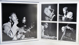 A black-and-white printed program or booklet spread showing four jazz musician photographs: a large portrait of a guitaritst on the left and four smaller portraits arranged in a grid on the right.