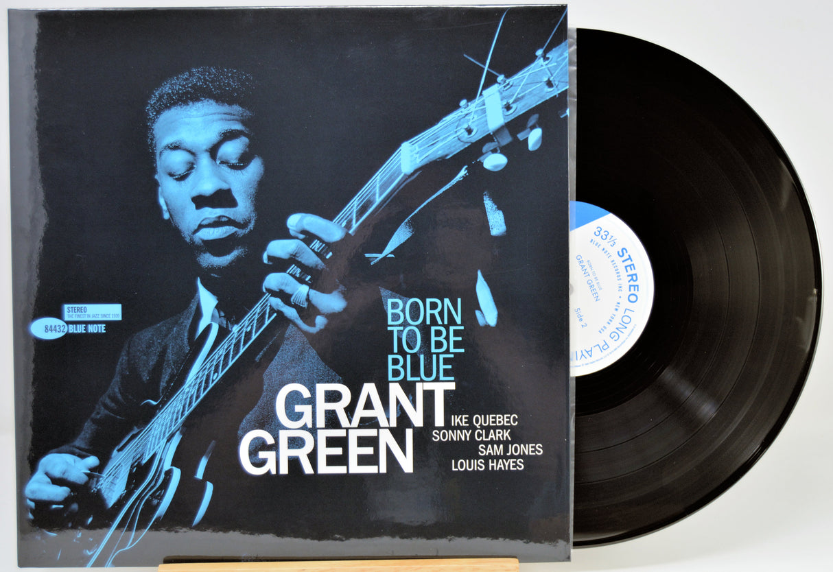 Grant Green 'Born to Be Blue' vinyl record LP with the album cover in front and the black record partially pulled out, showing the center label.