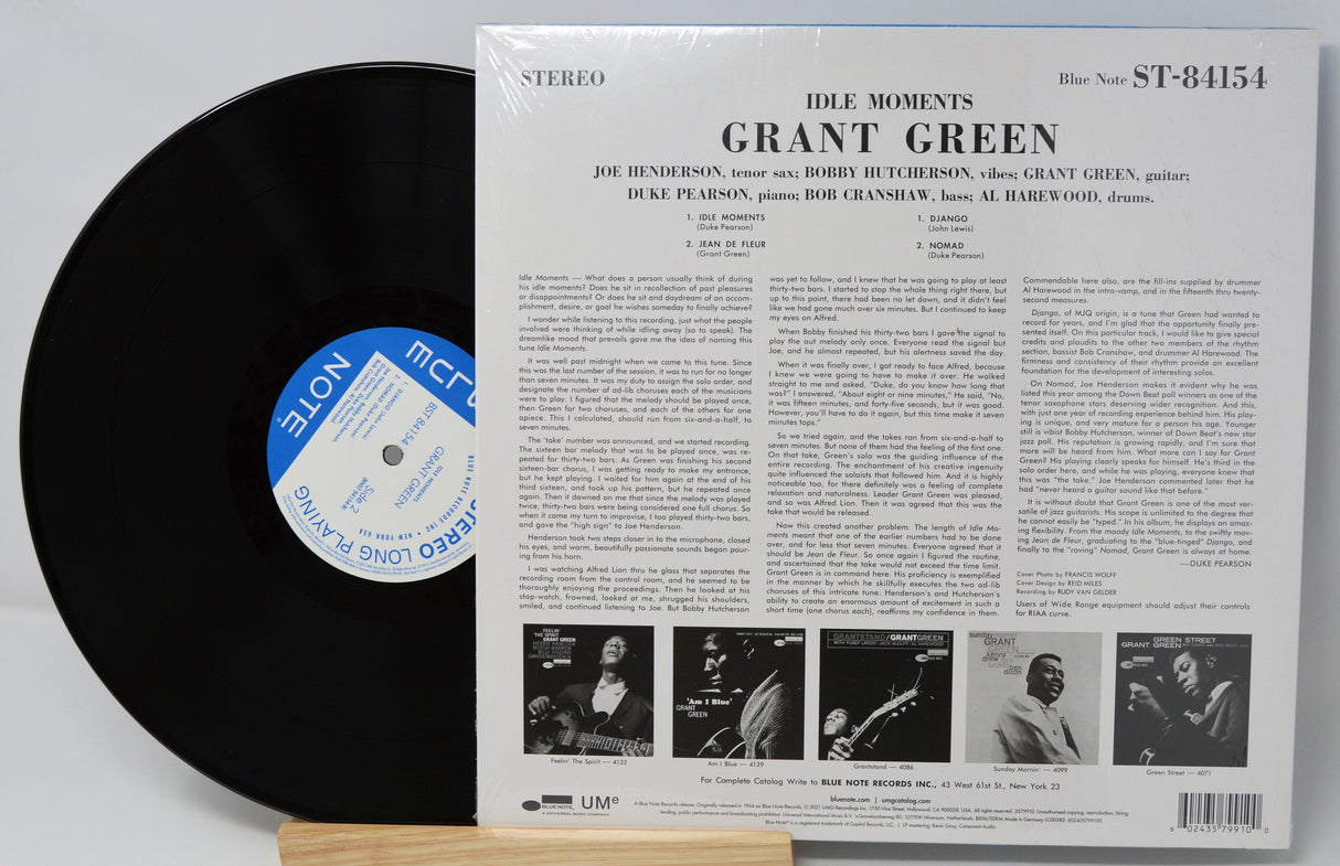 Back cover and vinyl record of Grant Green's Idle Moments Blue Note LP with tracklist and liner notes