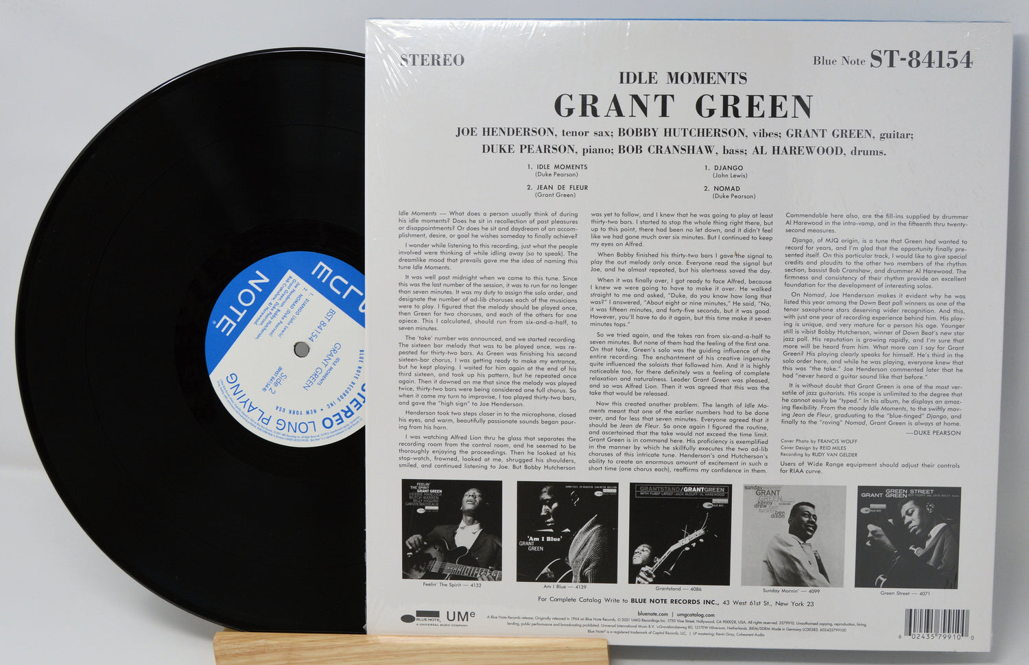 Back cover and vinyl record of Grant Green's Idle Moments Blue Note LP with tracklist and liner notes