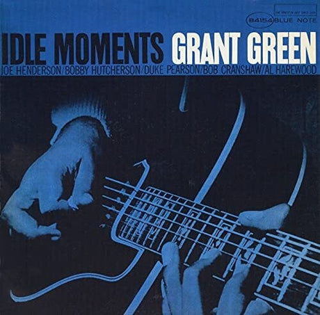 Album cover of 'Idle Moments' by Grant Green with a blue and black color scheme.