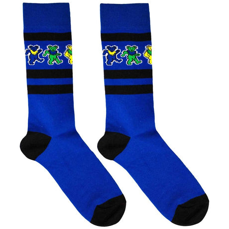 Pair of blue socks with black stripes and colorful bear designs on a white background
