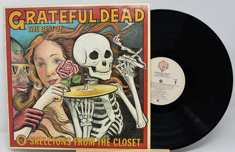 Vinyl record with cover featuring 'Grateful Dead' and skeleton illustration