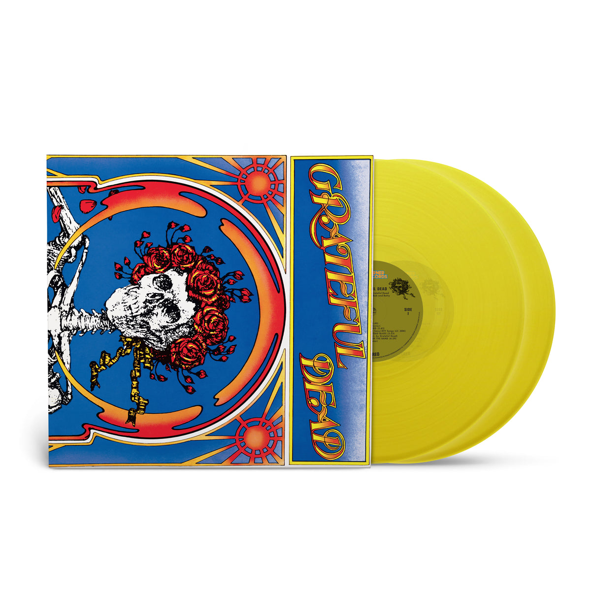 A clear yellow vinyl record of Grateful Dead - Skull & Roses with a colorful album cover featuring a skull with flowers and the Grateful Dead logo.