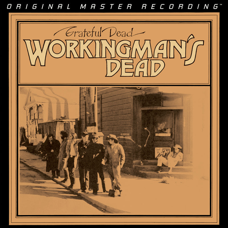 Album cover of 'Workingman's Dead' by Grateful Dead with sepia-toned photograph and text.