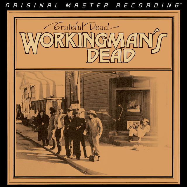 Album cover of 'Workingman's Dead' by Grateful Dead with sepia-toned photograph and text.