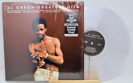 Vinyl record with cover featuring a person, displayed on a white background