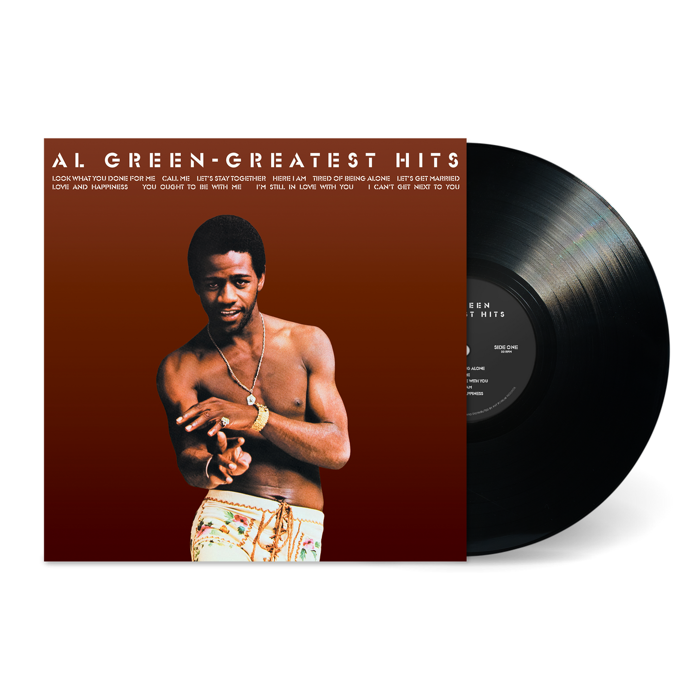 Vinyl record with Al Green's 'Greatest Hits' on a white background