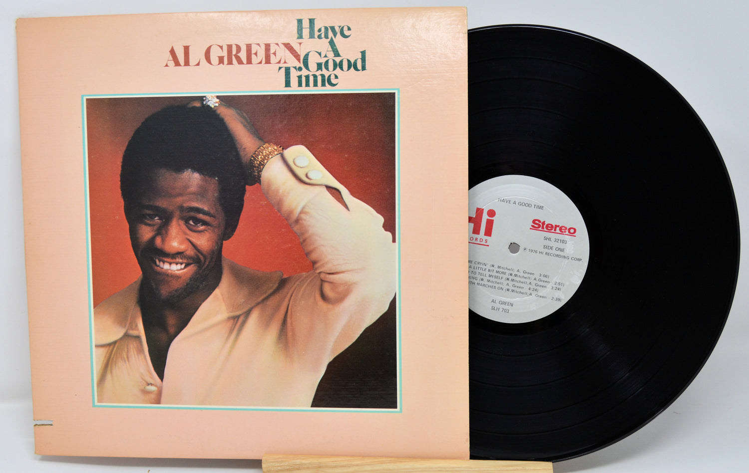 Vinyl record with cover featuring a smiling man, 'Have a Good Time' by Al Green.