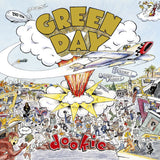 Album cover for 'Dookie' by Green Day with various illustrations and text.