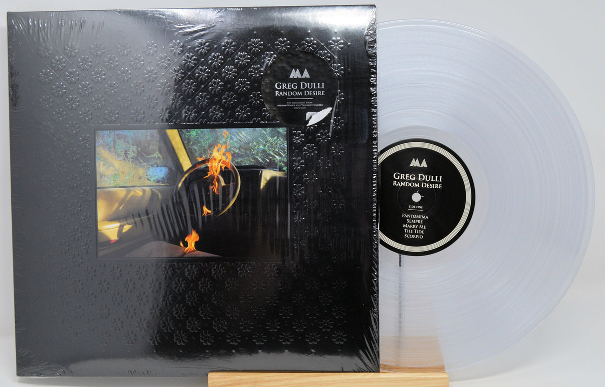 Greg Dulli 'Random Desire' clear vinyl LP showing front embossed cover and artwork