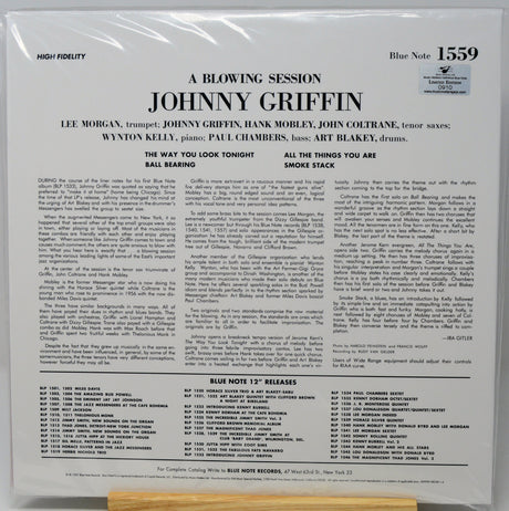 Back cover of a vinyl record sleeve for 'A Blowing Session: Johnny Griffin' on Blue Note, photographed flat against a white background with a small wooden stand visible at the bottom.