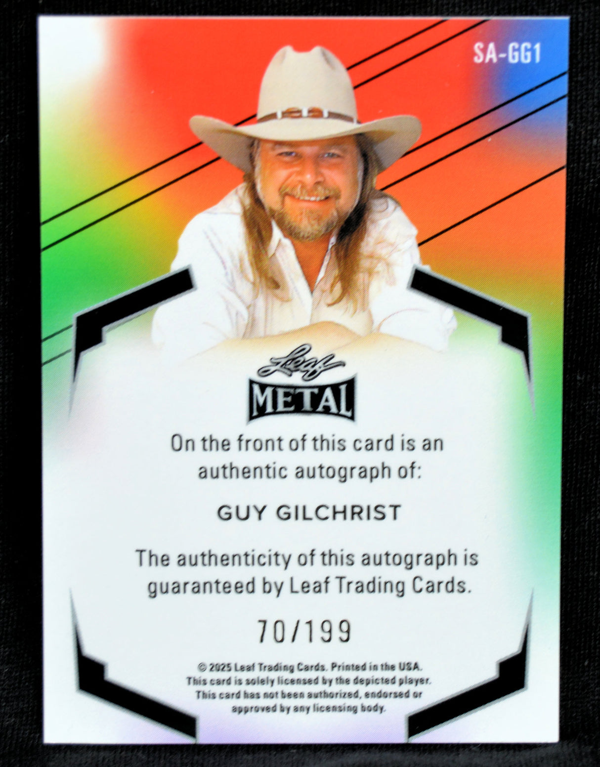 Trading card featuring Guy Gilchrist with a colorful gradient background numbered 70/199.