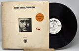 Front cover and vinyl record of Attila Zoller's Gypsy Cry LP promotional copy, with artist portrait