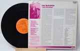 Back cover and vinyl record of Hal McKusick Jazz Workshop album showing track list and liner notes