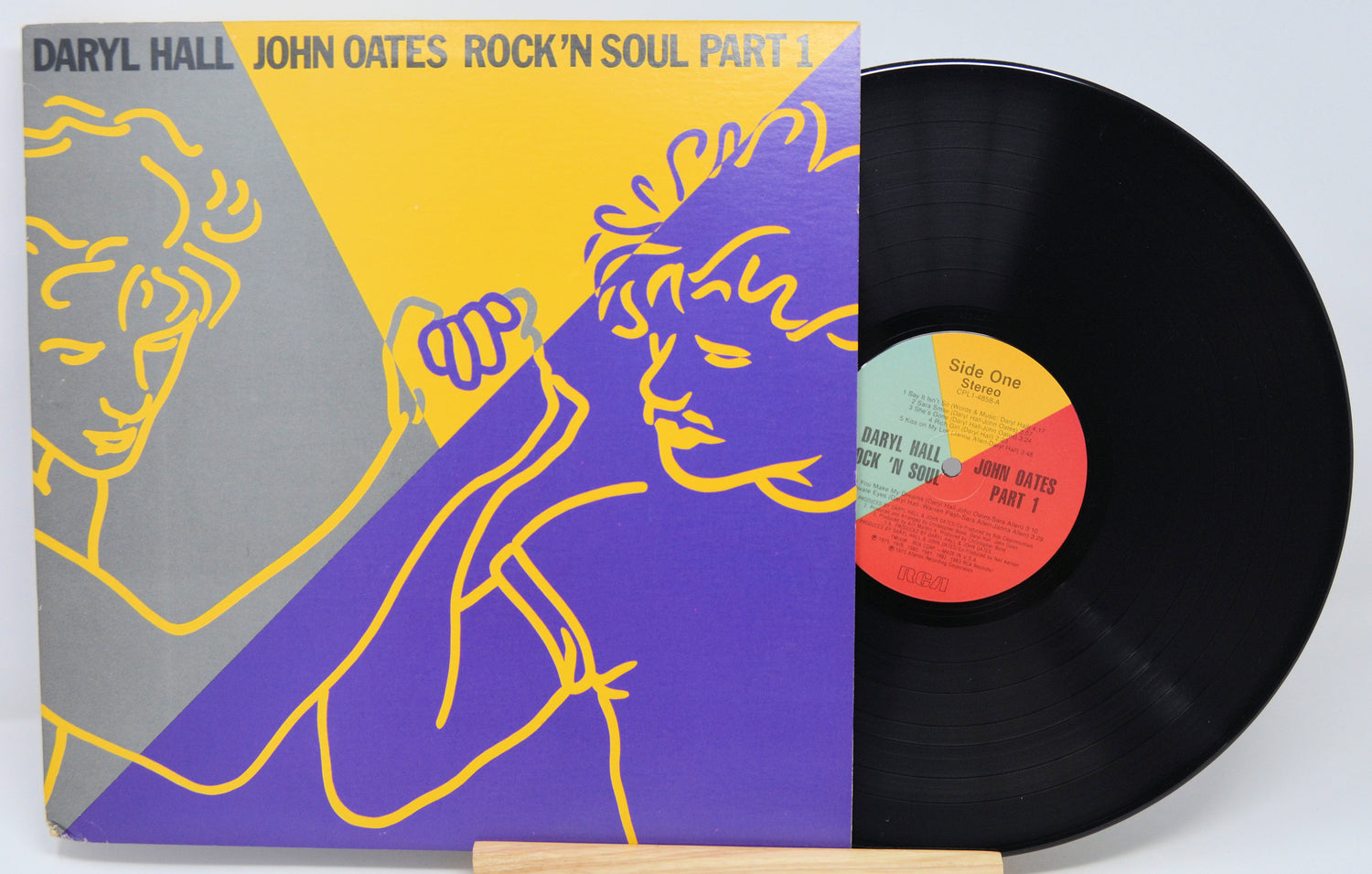 Vinyl record with cover featuring abstract design of two faces and text 'Daryl Hall & John Oates Rock 'n Soul Part I'.