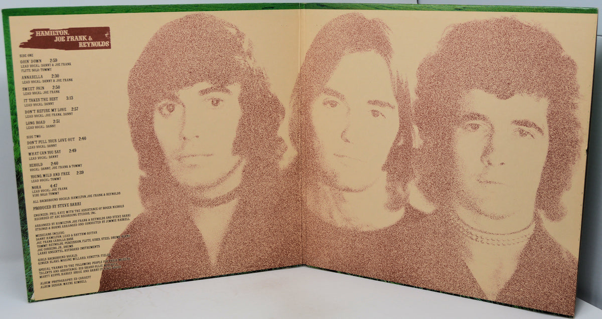 An open vinyl record sleeve or booklet showing three sepia-toned portraits of Frank Sinatra on the right page and a tracklist on the left page, photographed against a light neutral background.