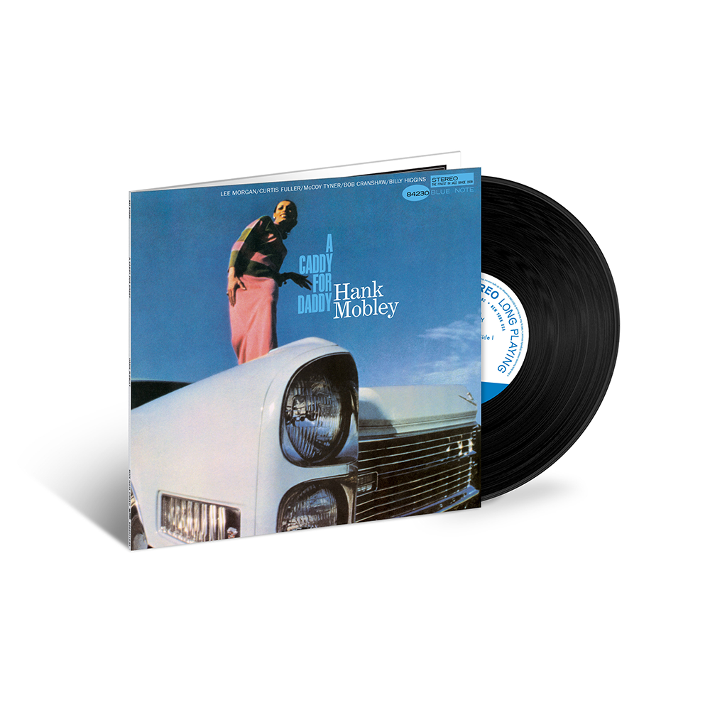 Vinyl record with cover featuring a person and car, on a white background