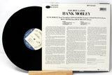 Back cover and vinyl record of Hank Mobley's 'Far Away Lands' Blue Note LP showing track list and liner notes