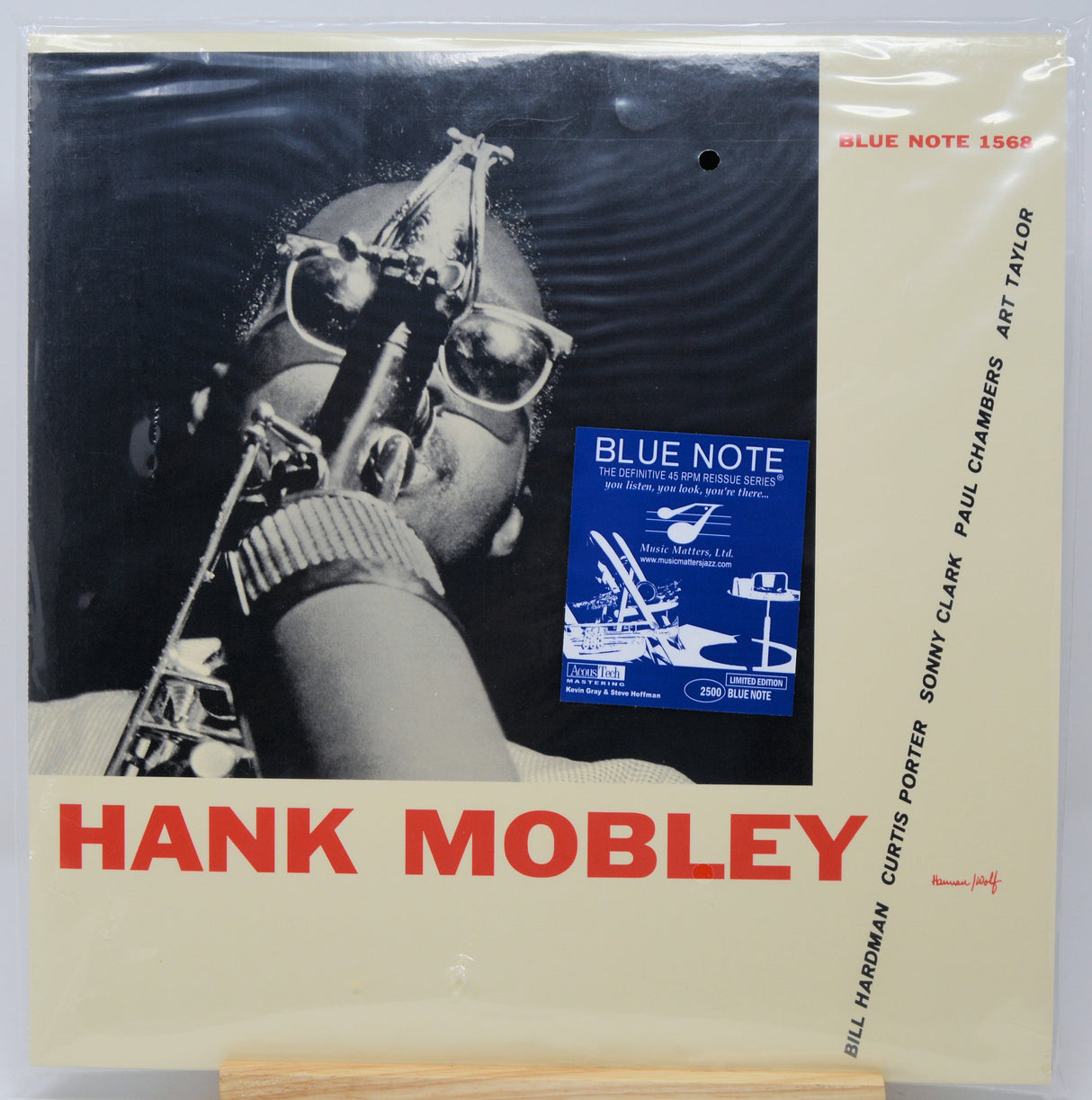 A vintage Blue Note 156LP vinyl record sleeve for Hank Mobley, featuring a black-and-white photo of a saxophonist with a blue label insert and red 'HANK MOBLEY' text on a cream background.