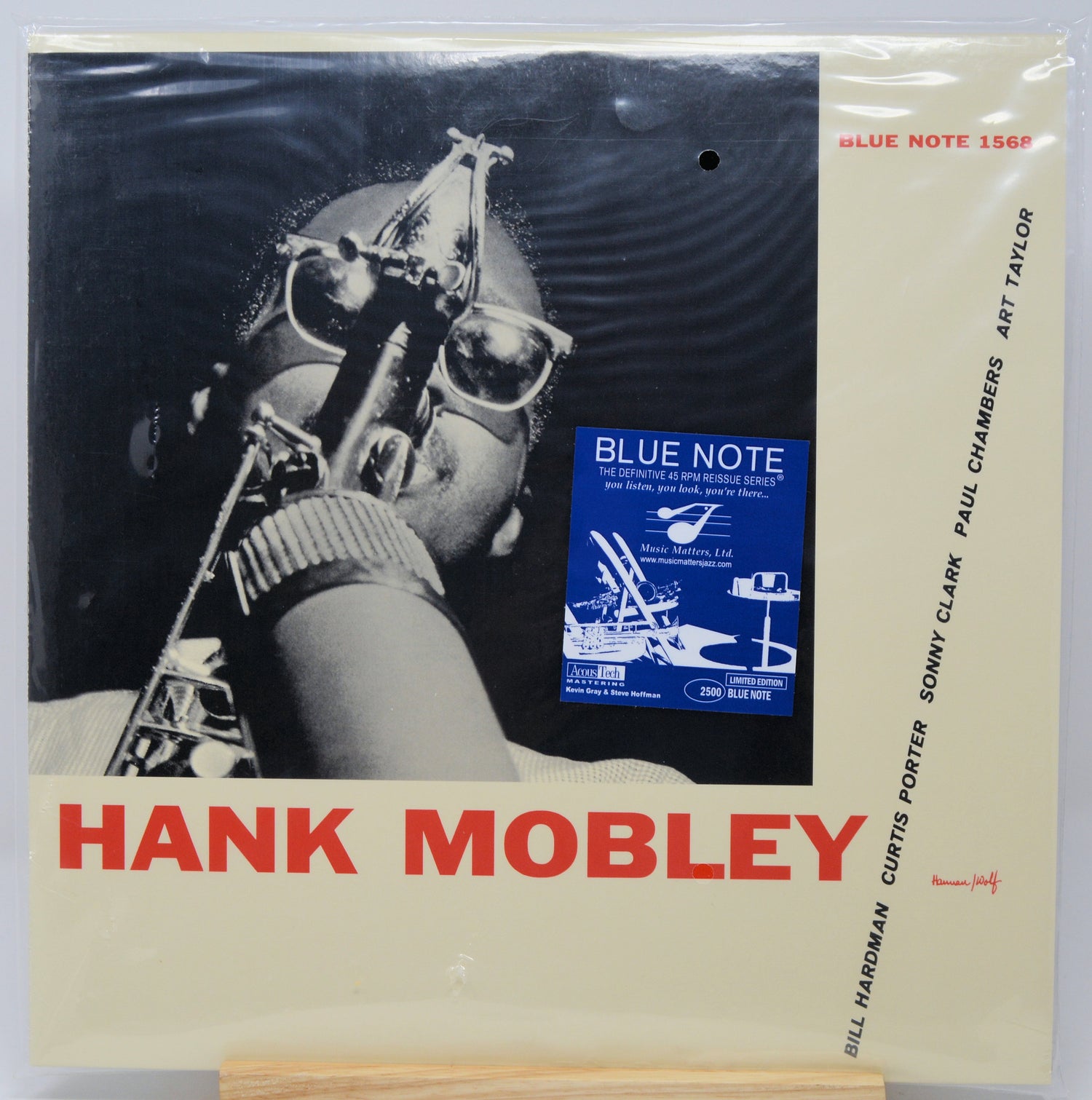 A vintage Blue Note 156LP vinyl record sleeve for Hank Mobley, featuring a black-and-white photo of a saxophonist with a blue label insert and red 'HANK MOBLEY' text on a cream background.