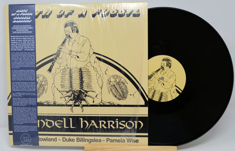 Vinyl record with cover featuring a stylized illustration of a person singing into a microphone.