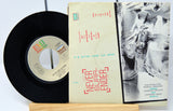 Vinyl record and its cover with 'Never Summer' text on a white background