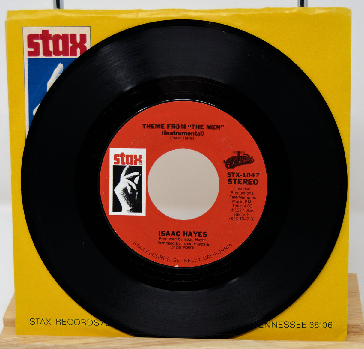 Vinyl record with red label and yellow Stax Records sleeve
