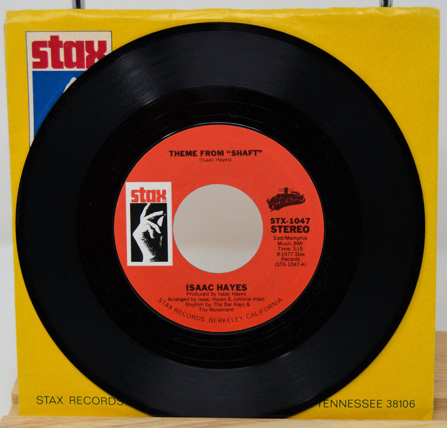 45 RPM record with red label and yellow Stax Records sleeve