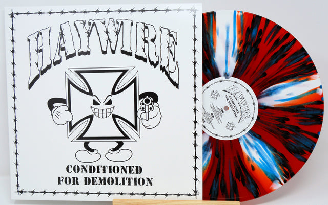 Haywire Conditioned for Demolition LP front cover and red, black, and blue splatter vinyl record