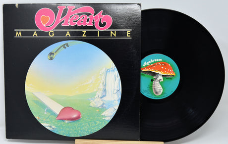 Vinyl record with colorful cover and 'Heart Magazine' branding