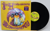 Vinyl record with 'The Jimi Hendrix Experience' album cover on a white background