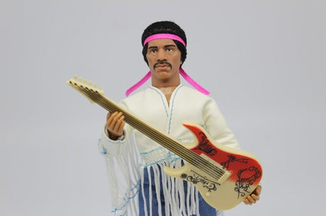 Action figure of a musician with a guitar on a gray background