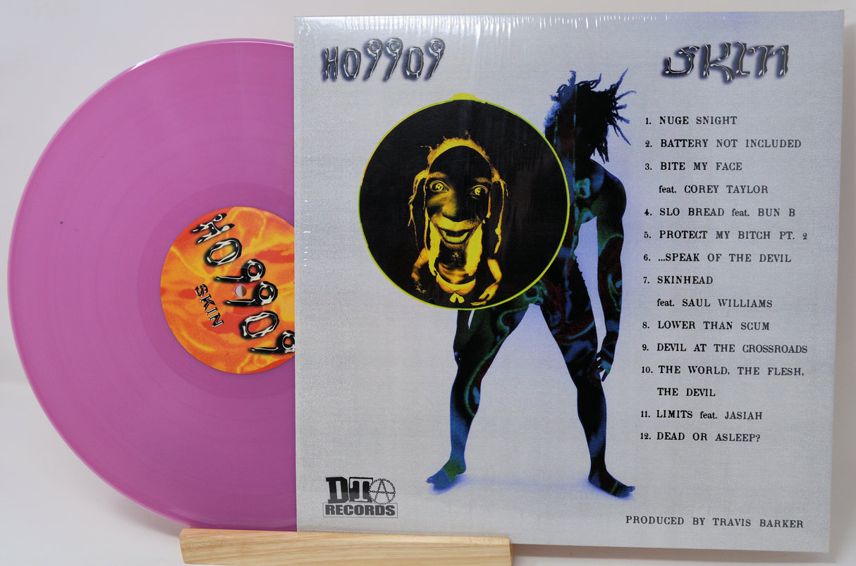 Ho99o9 'Skin' album back cover and purple vinyl LP with tracklist and bold graphic art
