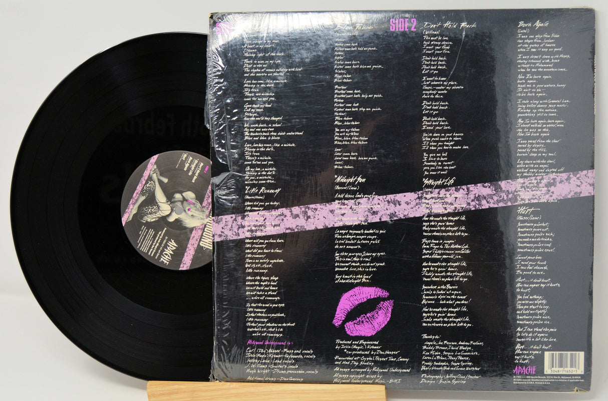 Back cover of Hollywood Underground vinyl LP showing track list and purple lipstick graphic