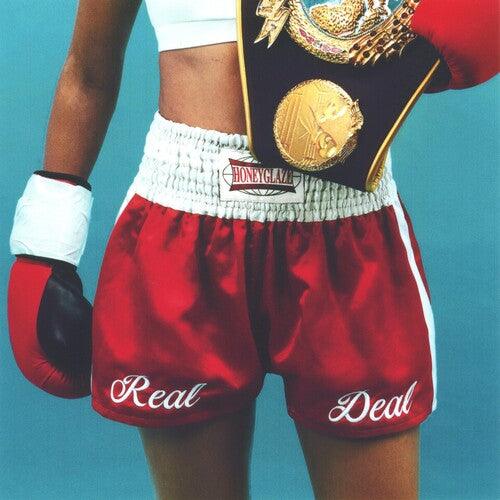 Honeyglaze Real Deal album cover featuring a boxer with championship belt and red shorts