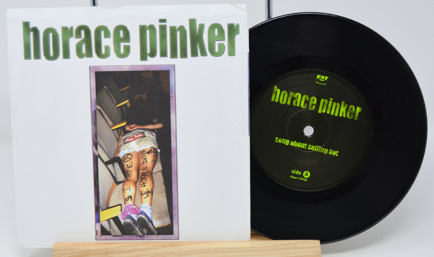 Vinyl record and cover with 'horace pinker' branding on a white background