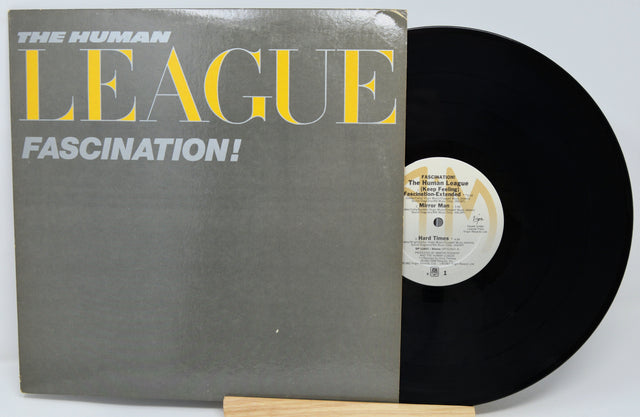 Vinyl record with 'The Human League' album 'Fascination!' on a white background
