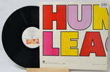 Vinyl record with a colorful album cover featuring the word 'HUMLEA'.
