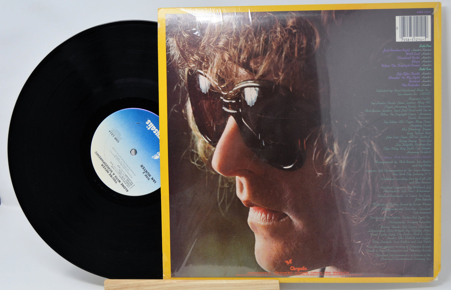Vinyl record with cover featuring a close-up of a person's face.